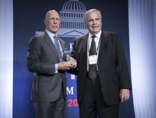Matthew Shay, left, presents Jim Otto with NRF’s J. Thomas Weyant Award.